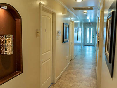 Hallways were designed with our residents in mind. They are large and spacious for any assisting devices that are needed. All doors are also wheel chair accessible.